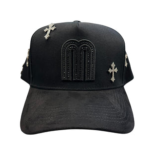 Black JG snapback hat with raised rhinestone M logo and silver cross accents