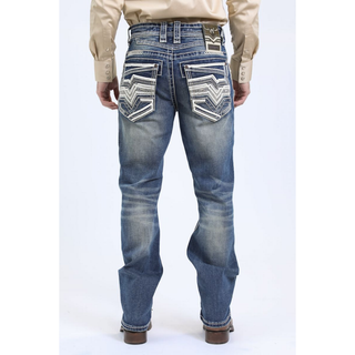 Rear full-body view of Platini Holt men's blue slim boot cut jeans showing twin embroidered back pockets.