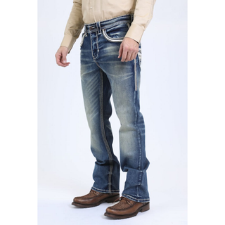Full-body front view of a man wearing Platini Holt blue slim boot cut jeans paired with brown woven leather shoes.