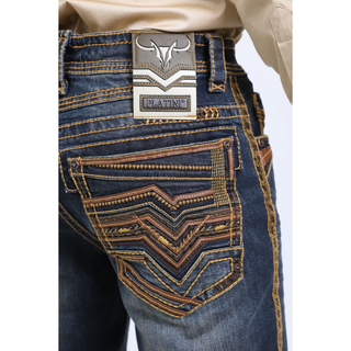 Close-up of back pocket embroidery on Platini Holt Dark Stone Jeans with layered stitching.