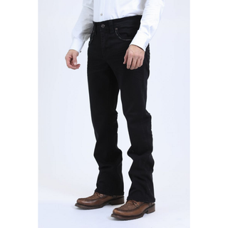 Front full-body view of Platini Holt men's black slim boot cut jeans paired with brown western boots