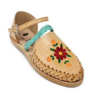 Women’s natural Mexican huarache sandals with colorful floral embroidery, turquoise braided strap and adjustable ankle buckle