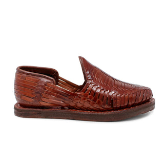 Men's handmade brown genuine leather huarache sandals featuring traditional woven Mexican craftsmanship, closed-toe slip-on design, leather-lined interior, cushioned footbed, and durable flexible outsole for everyday comfort.