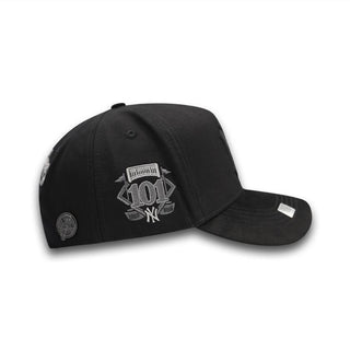 Right side view showing Yellow 101 NY embroidery patch on NY Black/Gray Snapback Hat