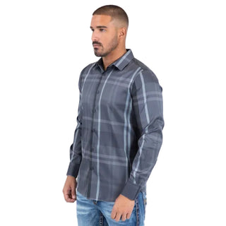 Man wearing a gray plaid shirt with a white background