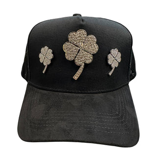 Black JG snapback hat with silver rhinestone clover accents on front panel