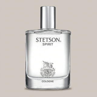 Clear cologne bottle with "Stetson Spirit" on it and a silver cap. 