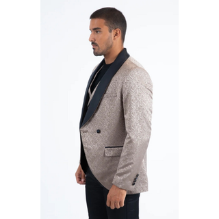 Man wearing a patterned blazer with a white background