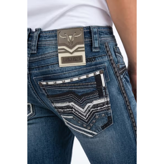 Close-up of Platini men's Holt western jeans featuring metallic stud embellishments, geometric chevron embroidery, contrasting stitching and Platini logo patch.