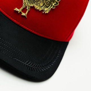 Close-up of black suede brim with gold crest embroidery – Gallo Roja snapback