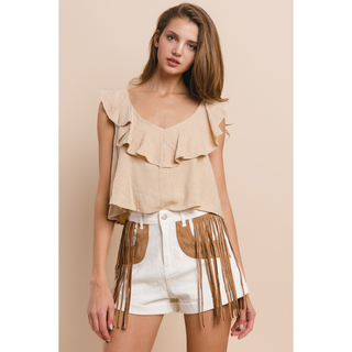 Women's white western fringe shorts with tan suede panels styled with beige ruffle top