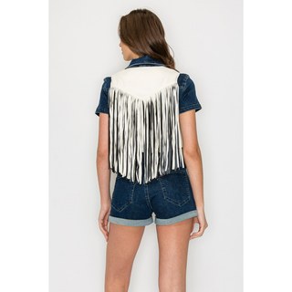 Back view of white western vest with fringe detailing