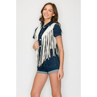 Side view of white western fringe vest layered with denim outfit