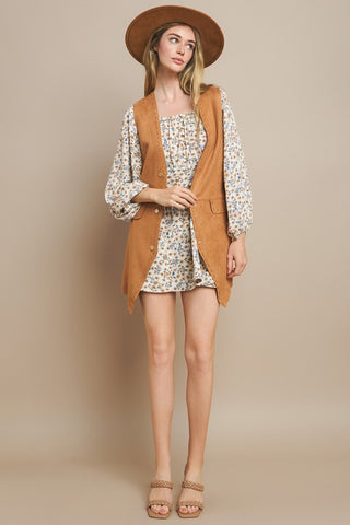 tan suede long western vest with button front and flap pockets