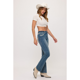 Angled full-body view of Westfield Eagle women's western bootcut jeans paired with cowboy boots and hat.
