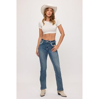 Front view of Westfield Eagle women's high-rise bootcut jeans in medium wash with white western hat.