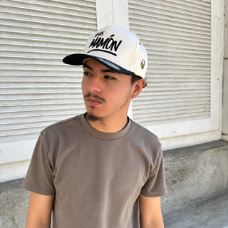 No Seas Mamón Snapback Cap Cream and Black – Spanish Phrase Hat