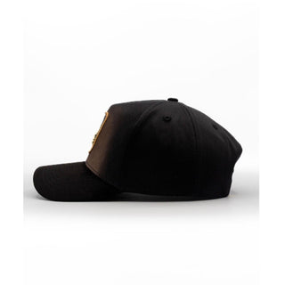Side profile of King Ranch black western hat with gold logo embroidery