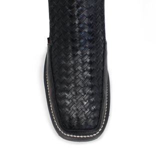 Close-up of square toe with petatillo  leather design on Artillero men’s black  boot