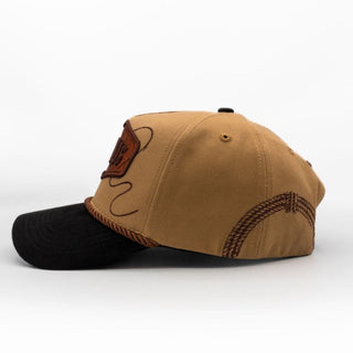 Western charro-style snapback hat with embroidered rope graphics and curved black brim