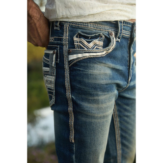 Side close-up of Platini Holt jeans showing the embroidered coin pocket and distressed wash finish.
