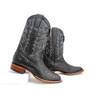 Side view showing the distinctive caiman belly scale pattern and classic Western stitching.