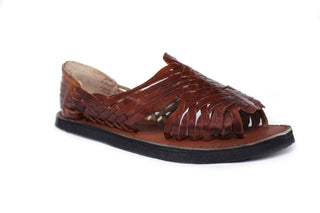 Side view of a classic leather woven chestnut colored Pachuco huarache