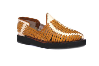 Side view of a classic honey and natural colored leather closed toe men's huarache with a thick black outer-sole