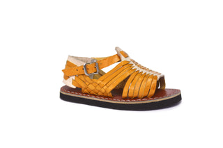 Side view of an opened toe leather woven kid's huarache in the color honey and white