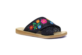 Side view of black leather crossed sandals with colorful floral embroidery