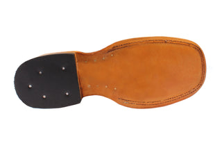 Honey colored leather and rubber heel outsole
