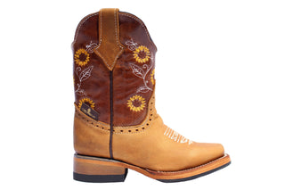 Side view of a honey colored leather boot with a sunflower embroidery